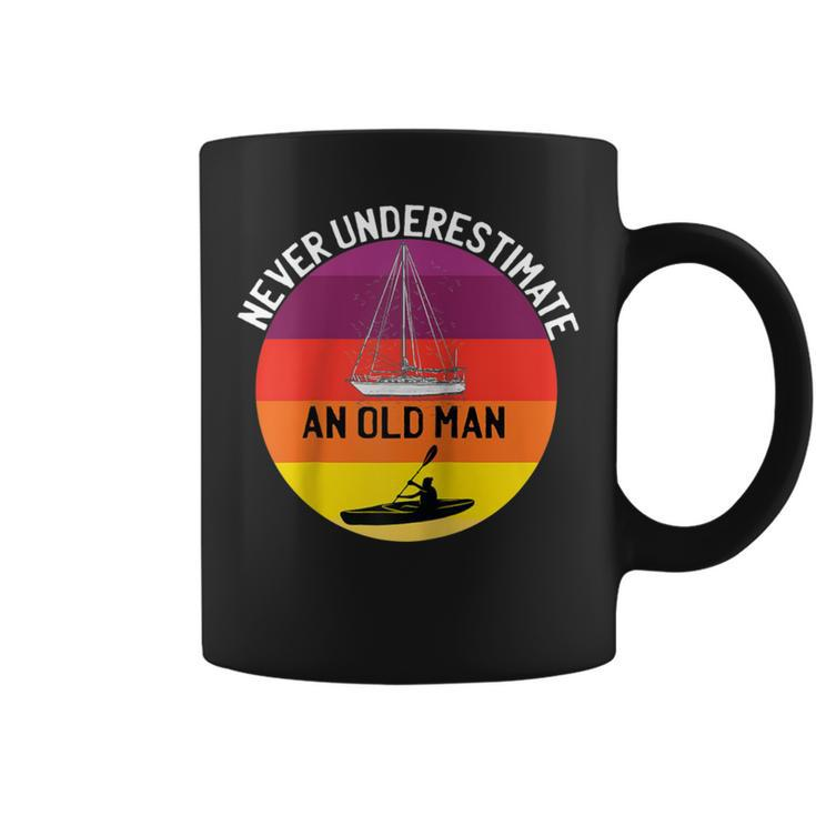 Never Underestimate An Old Man With A Kayak Sailboat Coffee Mug