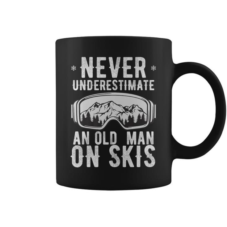 Never Underestimate An Old Man On Skis Winter Holiday Coffee Mug