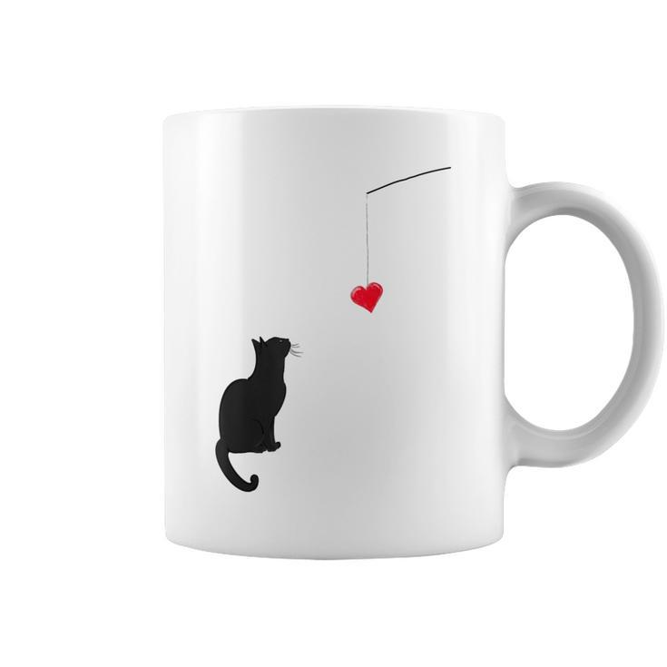 Cute Valentine's Day With A Cat Looking At A Heart Coffee Mug