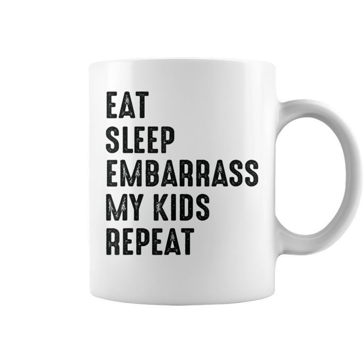 Eat Sleep Embarrass Kids Repeat Dad Coffee Mug
