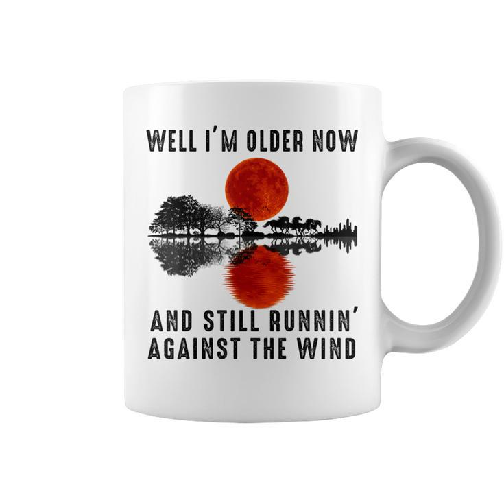 Well I’M Older Now But I’M Still Running Against The Wind Coffee Mug