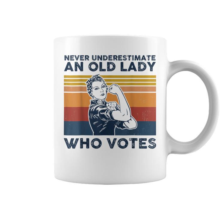 Never Underestimate An Old Lady Who Votes Feminist Coffee Mug