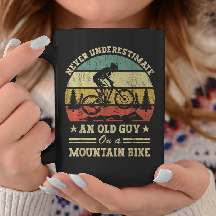 Never Underestimate An Old Guy On A Mountain Bike Coffee Mug Funny Gifts