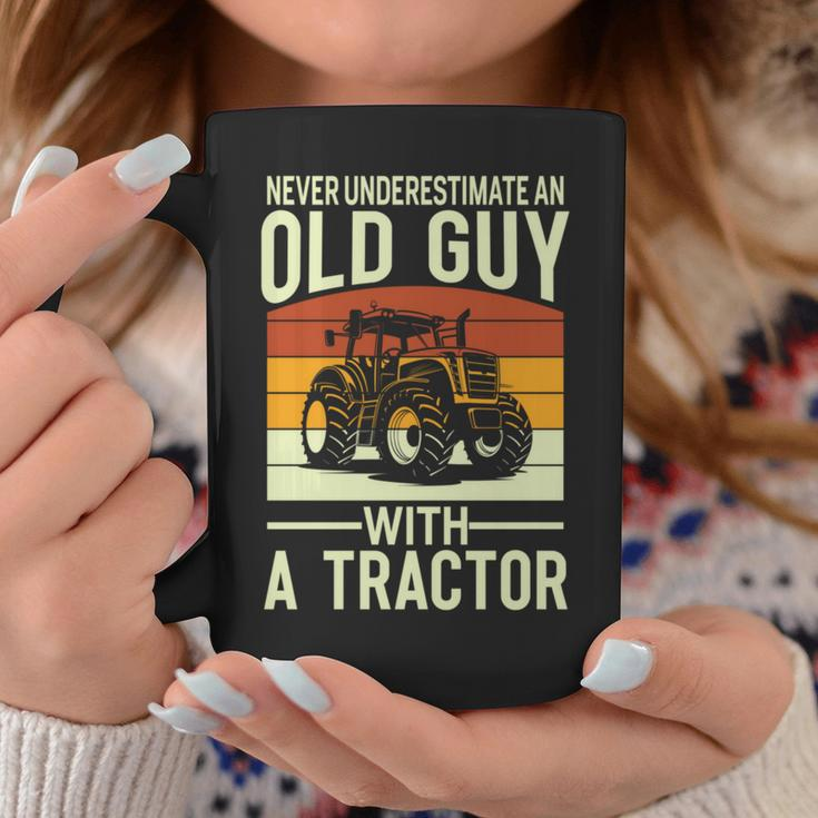 Never Underestimate An Old Guy With A Tractor Farmer Coffee Mug Funny Gifts