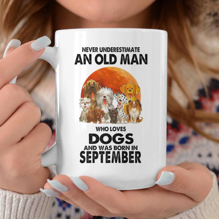 Never Underestimate An Old Man Who Loves Dogs Born September Coffee Mug Unique Gifts