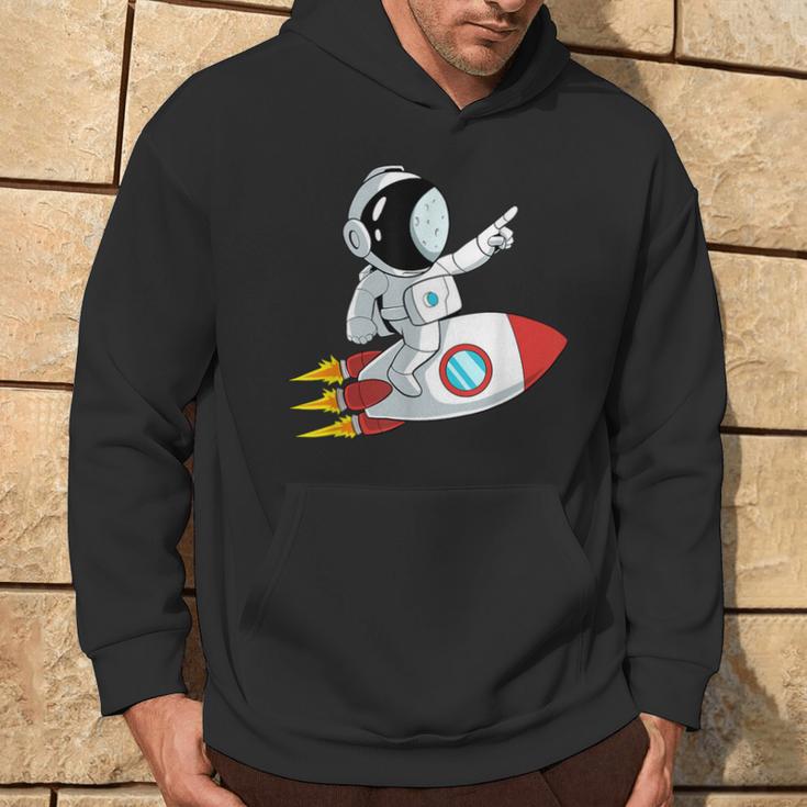 Astronaut und Rakete im Weltraum Hoodie, Unisex Schwarz Lebensstil