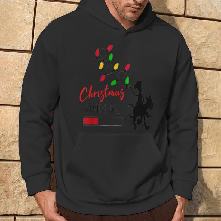 Christmas 2023 Loading Cowboy Lights Hoodie Lifestyle