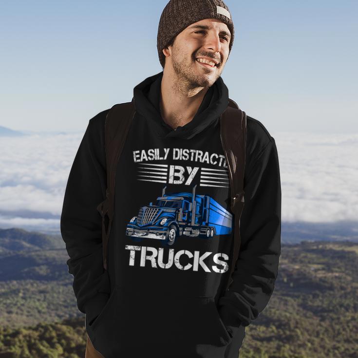 Easily Distracted By Trucks Semi Trailer Trucks Driver Hoodie Lifestyle