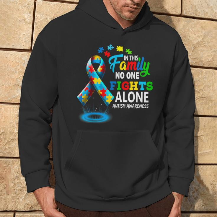 In This Family Nobody Fights Alone Blue Autism Awareness Hoodie Lifestyle