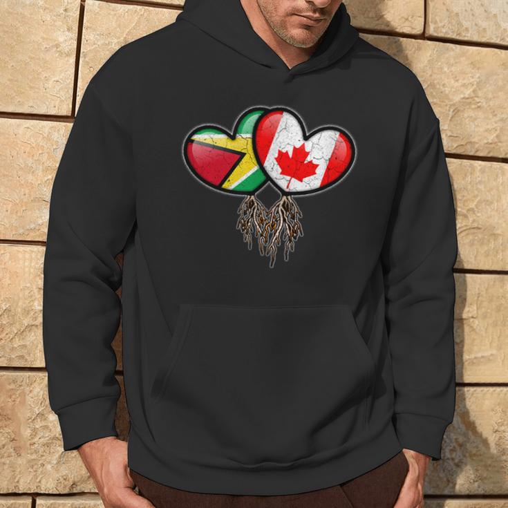 Guyanese Canadian Flags Inside Hearts With Roots Hoodie Lifestyle