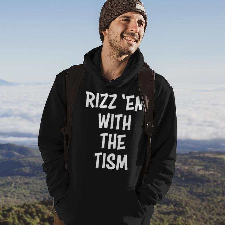 Rizz 'Em With The Tism Hoodie Lifestyle