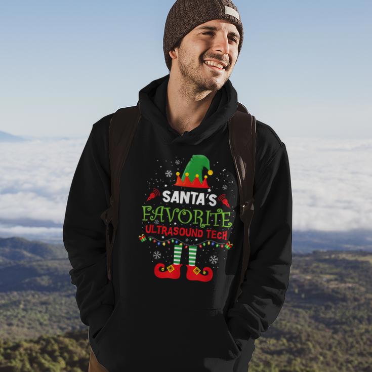 Santa's Favorite Ultrasound Tech Elf Christmas Light Hoodie Lifestyle