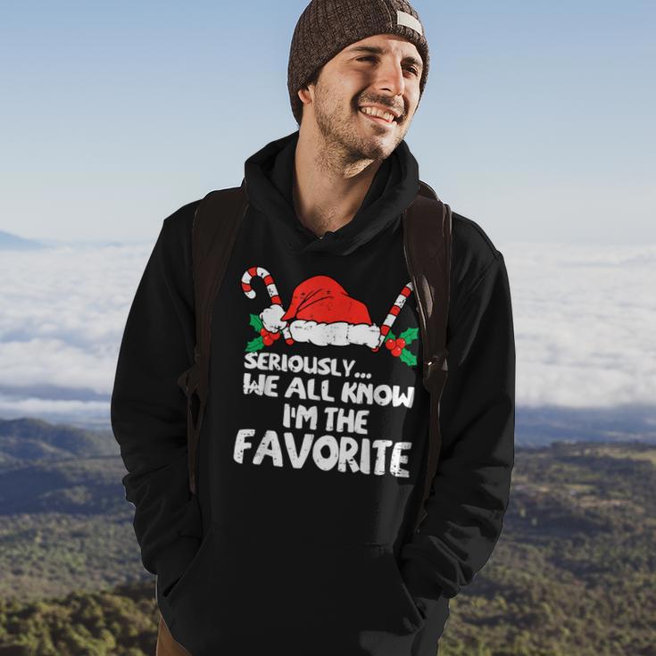 Seriously…We All Know I'm The Favorite Santa Hat Xmas Family Hoodie Lifestyle