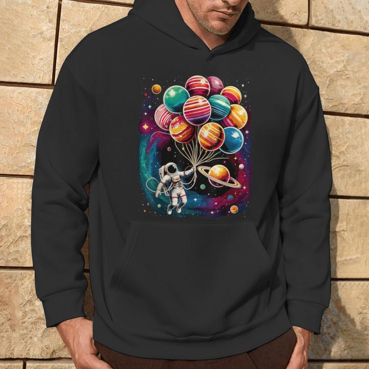 Solar System Astronaut Holding Planet Balloons Stem Hoodie Lifestyle