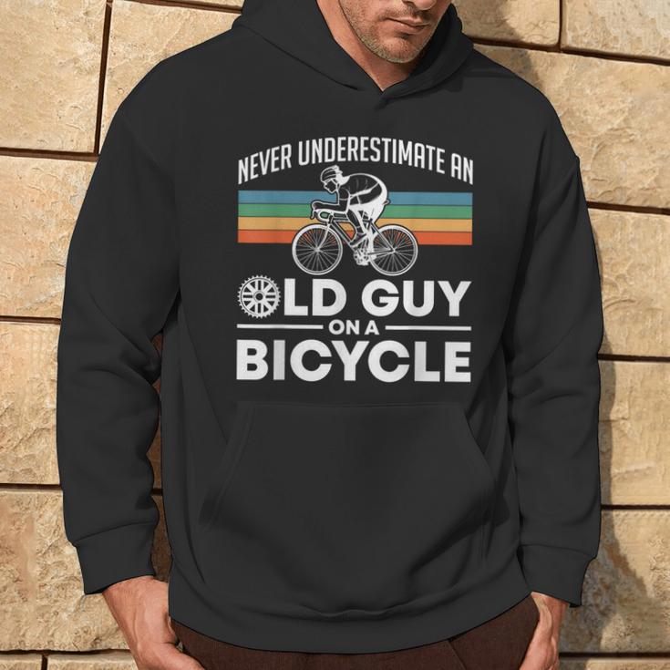 Never Underestimate An Old Guy On A Bicycle Retro Vintage Hoodie Lifestyle