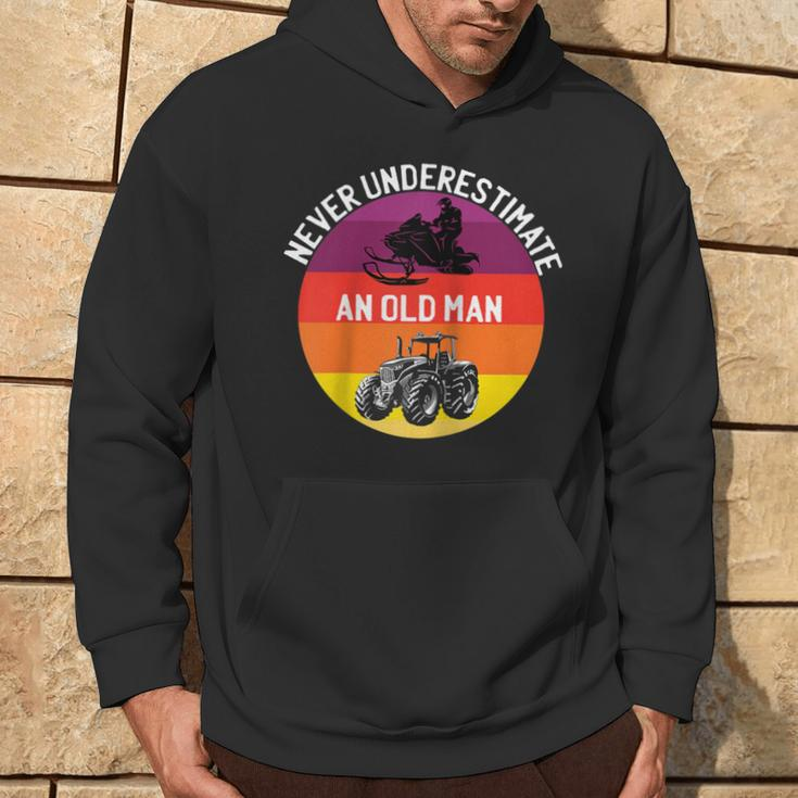 Never Underestimate An Old Man With A Snowmobile Tractor Hoodie Lifestyle