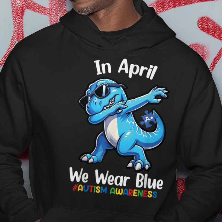 In April We Wear Blue Autism Awareness Month Dinosaur T-Rex Hoodie Unique Gifts
