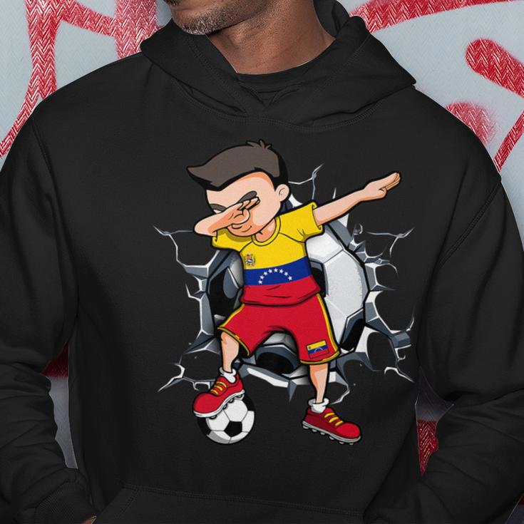 Dabbing Soccer Boy Venezuela Football Fans Ball Cracked Wall Hoodie Unique Gifts