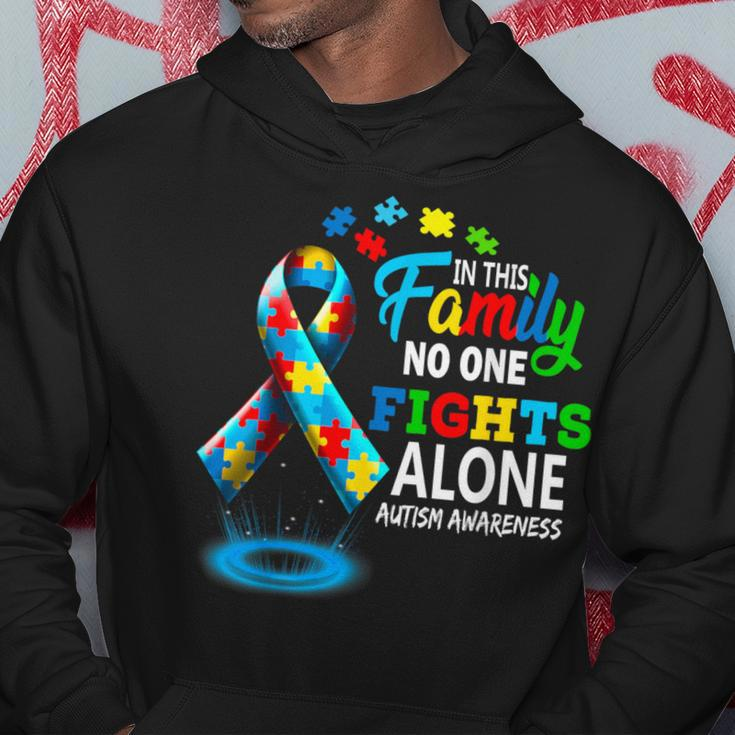 In This Family Nobody Fights Alone Blue Autism Awareness Hoodie Unique Gifts