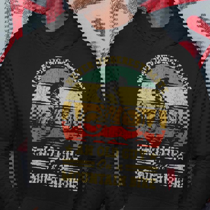Never Underestimate An Old Guy On A Mountain Bike Hoodie Funny Gifts