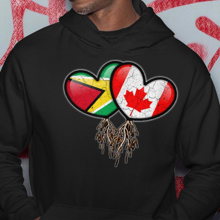 Guyanese Canadian Flags Inside Hearts With Roots Hoodie Unique Gifts