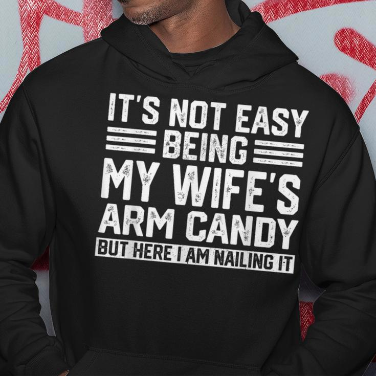 Its Not Easy Being My Wife's Arm Candy Husband Hoodie Funny Gifts