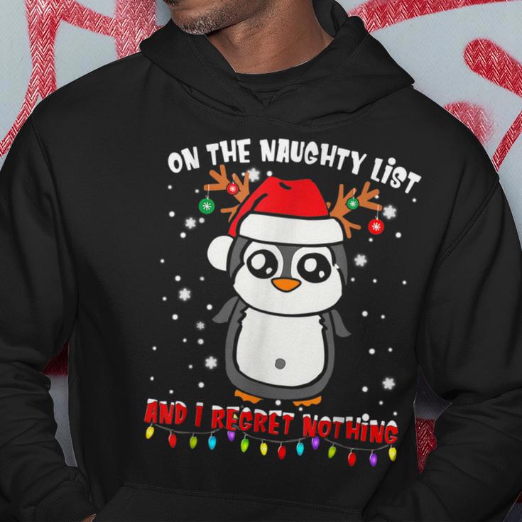 On The Naughty List And I Regret Nothing Penguin Xmas Hoodie Unique Gifts