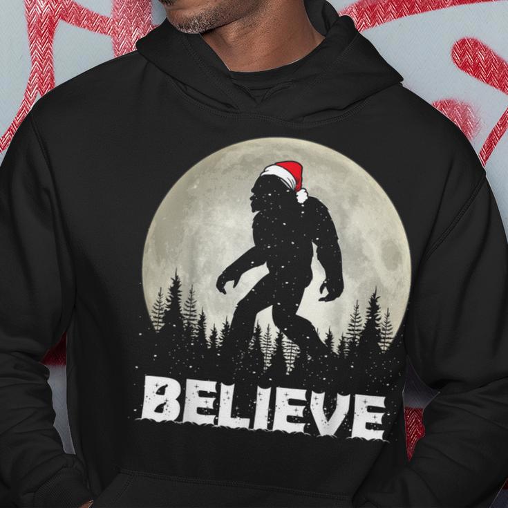 Santa Hat Bigfoot Believe Christmas Lights Rock Sasquatch Hoodie Unique Gifts