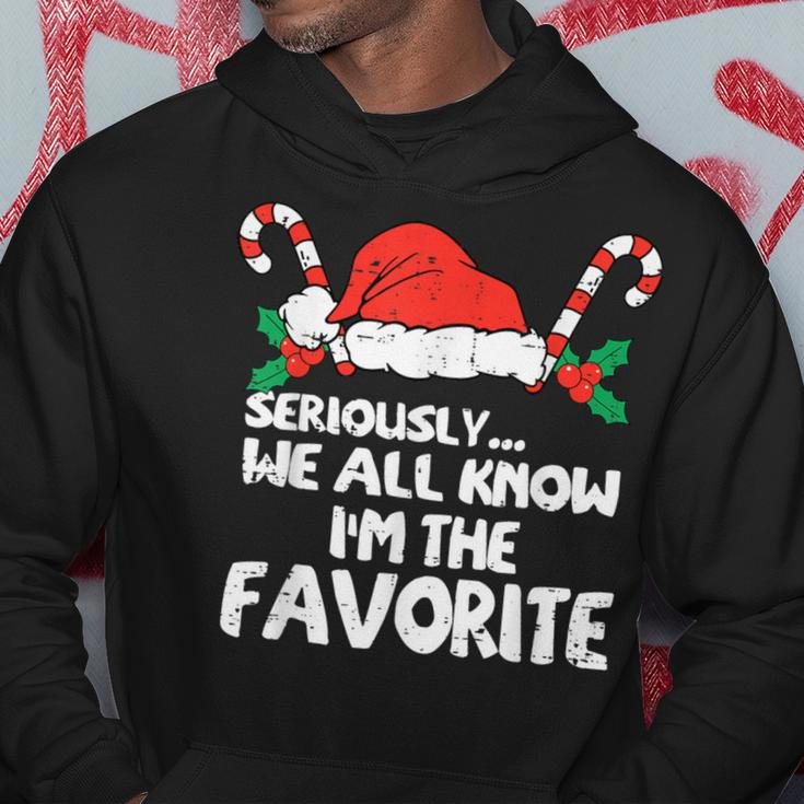 Seriously…We All Know I'm The Favorite Santa Hat Xmas Family Hoodie Unique Gifts