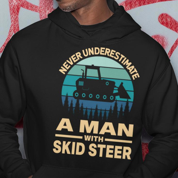 Never Underestimate A Man With A Skid Sr Construction Hoodie Funny Gifts