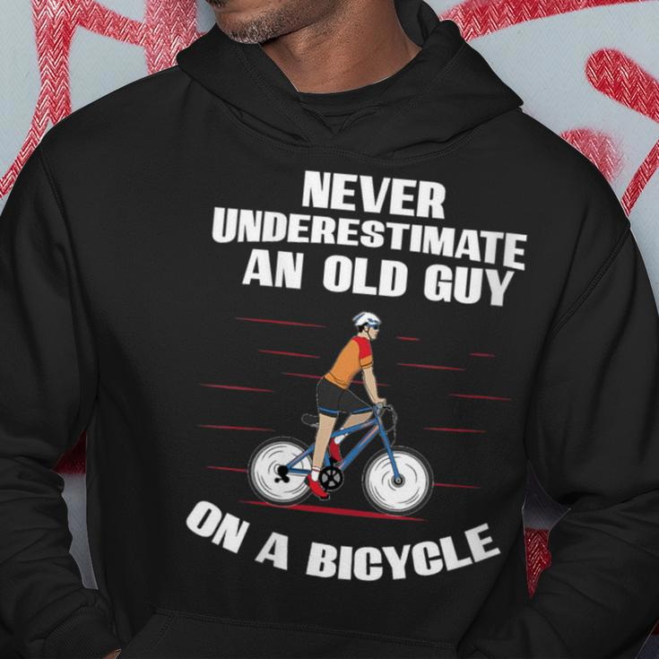 Never Underestimate An Old Guy On A Bicycle Fathers Day Hoodie Personalized Gifts