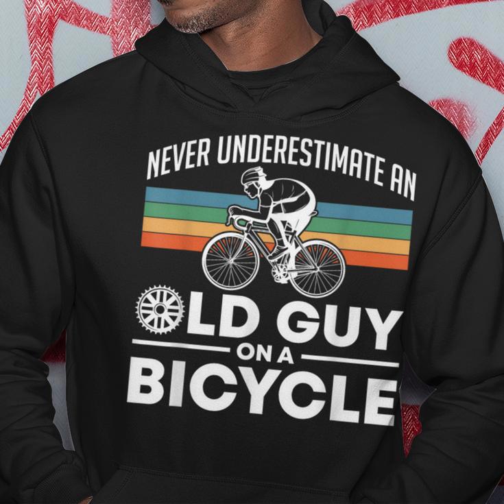 Never Underestimate An Old Guy On A Bicycle Retro Vintage Hoodie Unique Gifts