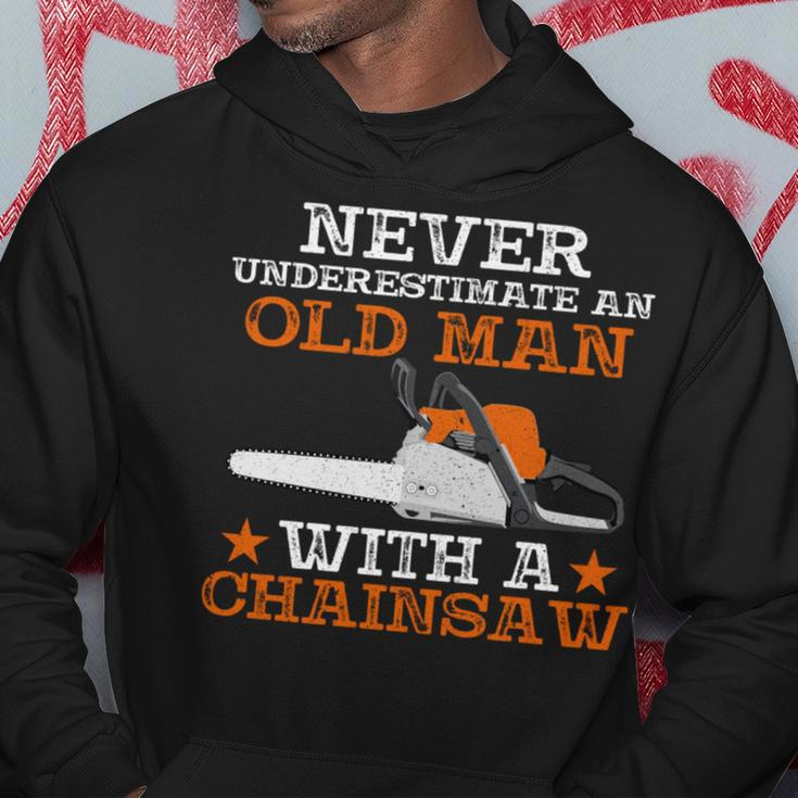 Never Underestimate An Old Man With Chainsaw Lumberjack Wood Hoodie Funny Gifts