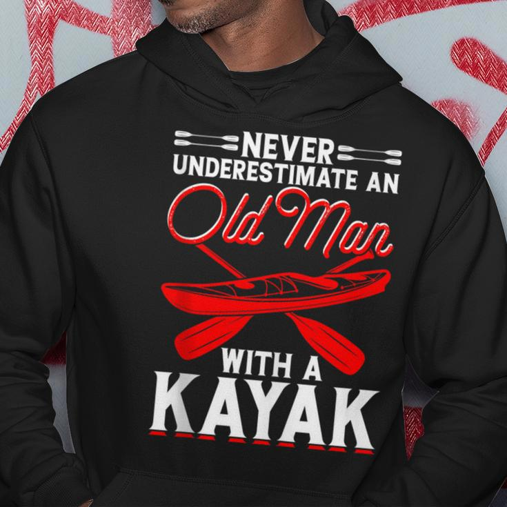 Never Underestimate An Old Man With A Kayak Kayaking Hoodie Funny Gifts