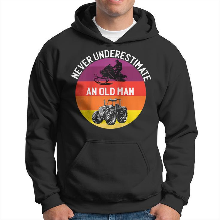 Never Underestimate An Old Man With A Snowmobile Tractor Hoodie