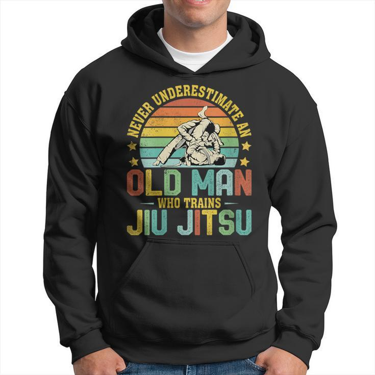 Never Underestimate An Old Man Who Trains Jiu Jitsu Mens Hoodie