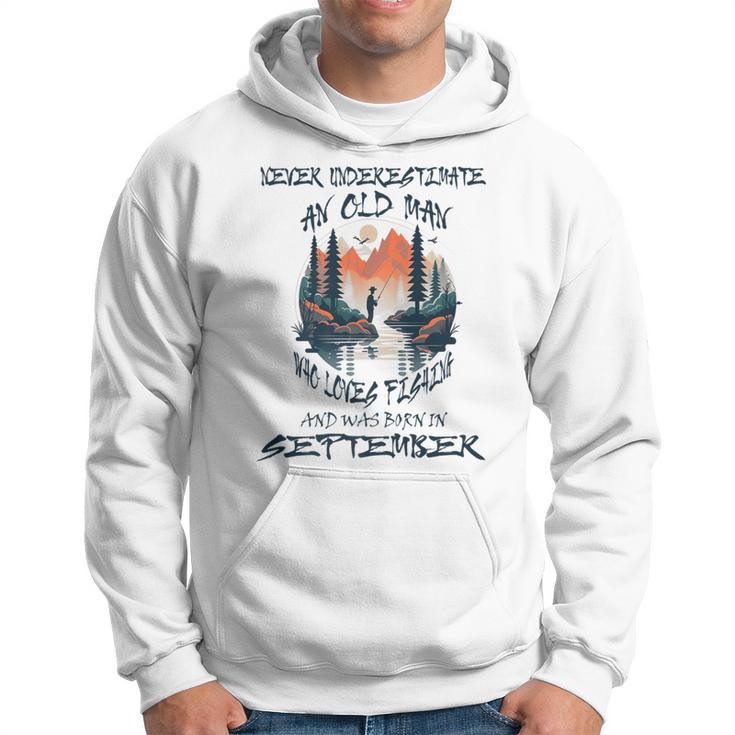 Never Underestimate Old Man Loves Fishing Born In September Hoodie