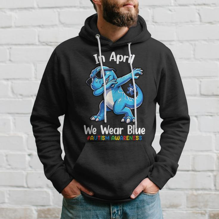 In April We Wear Blue Autism Awareness Month Dinosaur T-Rex Hoodie Gifts for Him