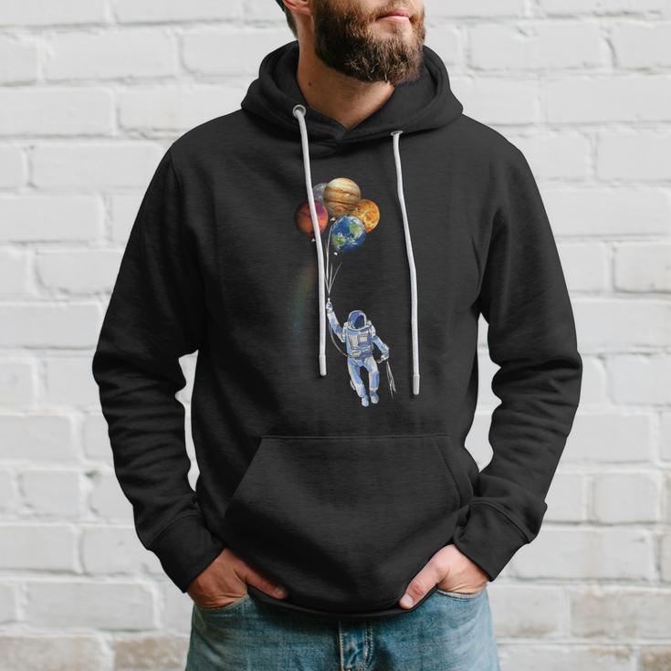 Astronaut Space Spaceman Holding Planet Balloon Hoodie Gifts for Him