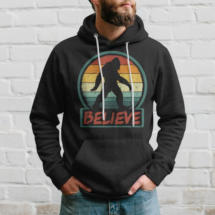 Bigfoot Believe Retro Sasquatch Cryptid Sunset Silhouette Hoodie Gifts for Him