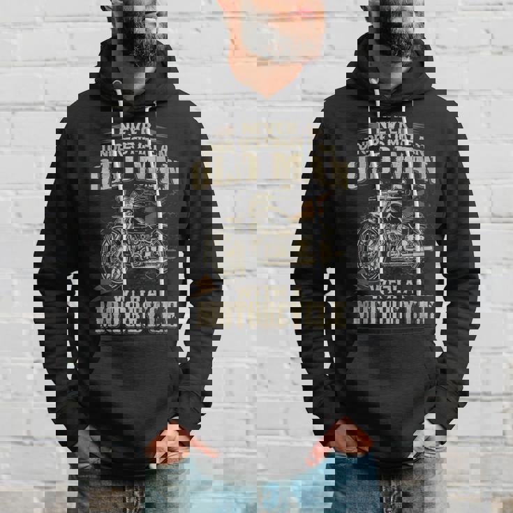 Bikers Never Underestimate An Old Man On A Motorbike Biker Hoodie Gifts for Him