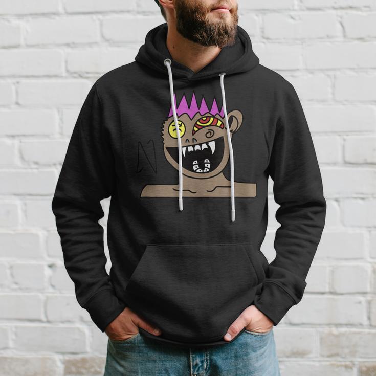 Funky Monster Gesicht Hoodie Schwarz mit Farbakzenten Geschenke für Ihn