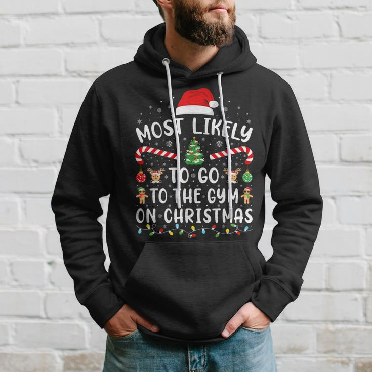 Most Likely To Go To The Gym On Christmas Family Party Joke Hoodie Gifts for Him