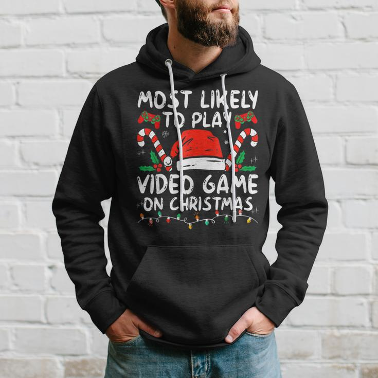 Most Likely To Play Video Games On Christmas Family Matching Hoodie Gifts for Him