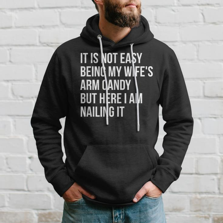 Not Easy Being My Wife's Arm Candy But Here I Am Nailing It Hoodie Gifts for Him