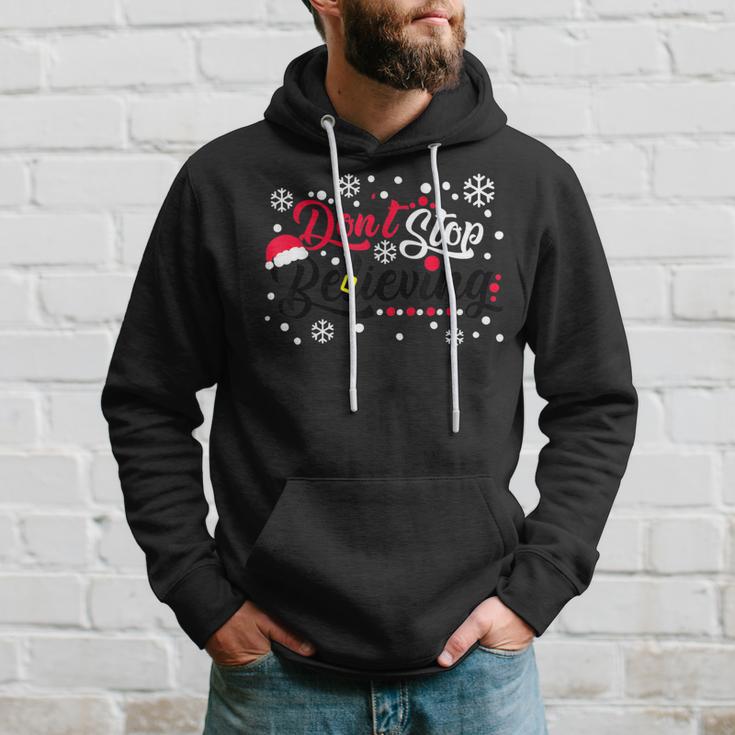 Do Not Stop Christmas Believing Santa Hat Reindeer Winter Hoodie Gifts for Him