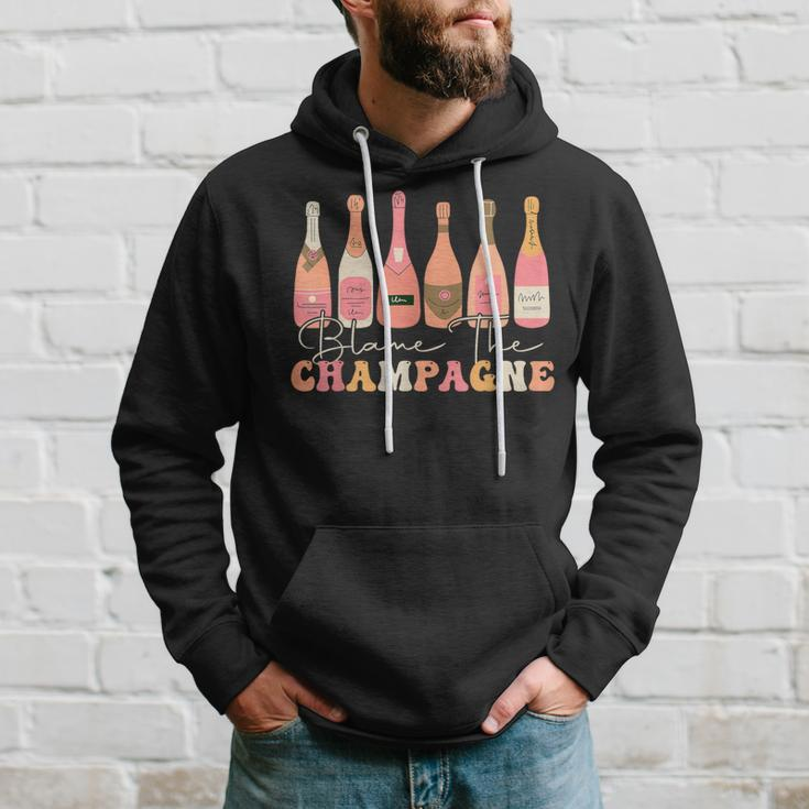 Retro Blame The Champagne Happy New Year 2024 Party Friends Hoodie Gifts for Him