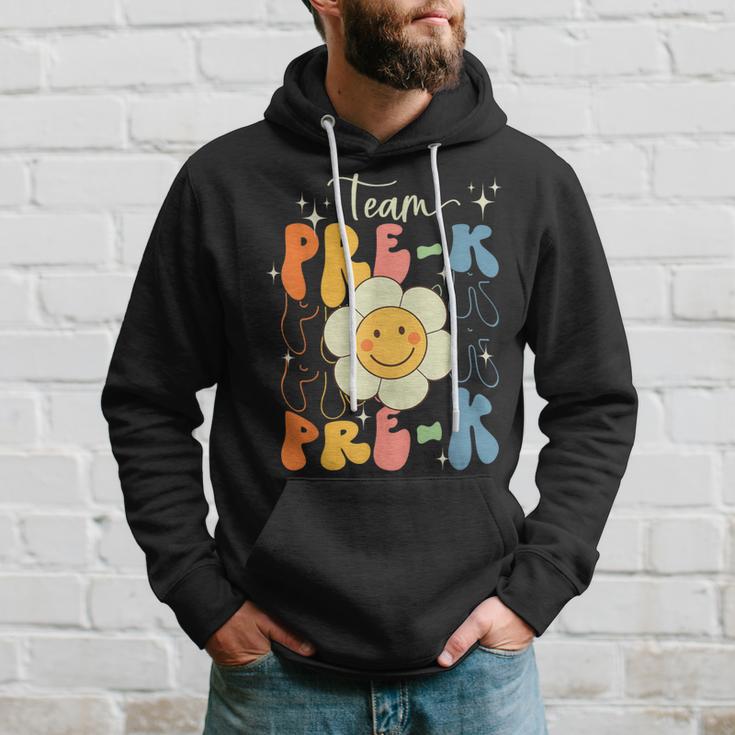 Smile Face First Day Of Team Prek Back To School Groovy Hoodie Gifts for Him