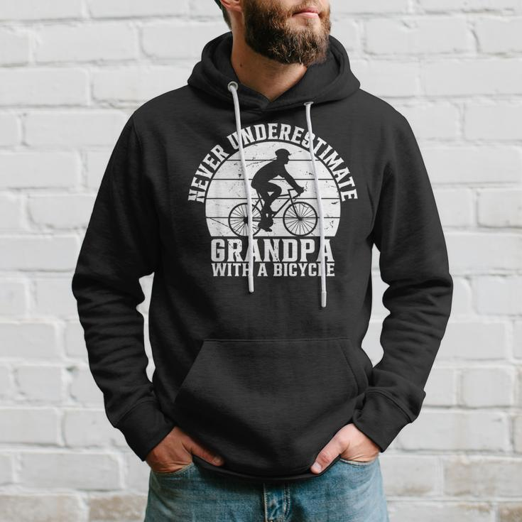 Never Underestimate Grandpa With A Bicycle Racing Bike Hoodie Gifts for Him