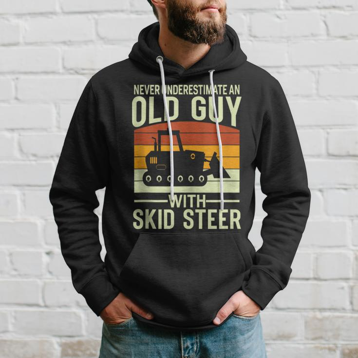Never Underestimate Old Guy With A Skid Sr Construction Hoodie Gifts for Him